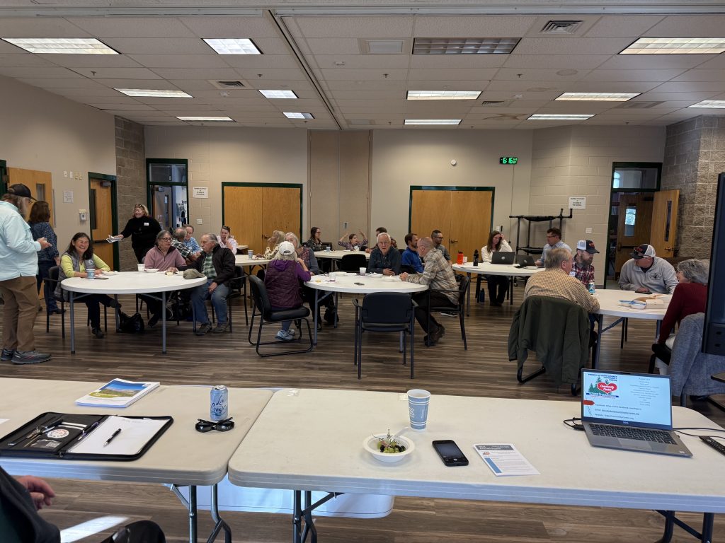 Attendees gathering for our annual open meeting. Courtesy Carolyn Collins Petersen.